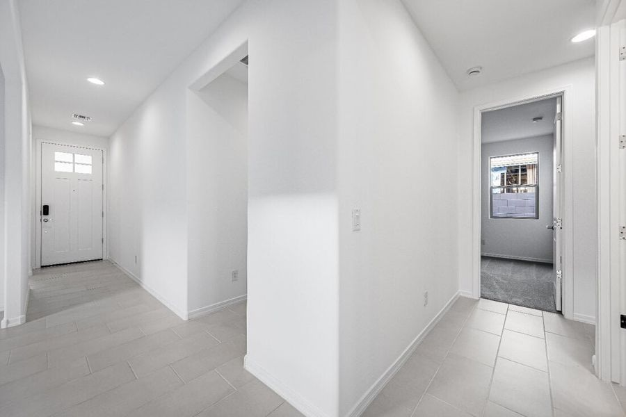 Representative unfurnished interior of a home built from the Sandstone by Taylor Morrison in Artisan at Asante Discovery Collection, Surprise (Image 12). Representative unfurnished interior of a home built from the Sandstone by Taylor Morrison in Artisan at Asante Discovery Collection, Surprise (Image 12).