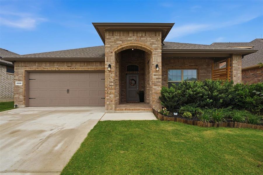 Front exterior of a new home in , Haslet, TX, highlighting curb appeal (Image 22).