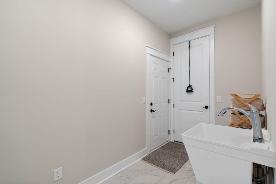 Furnished interior view inside a new home in K. Hovnanian's® Four Seasons at Lakes of Cane Bay, Summerville (Image 45).