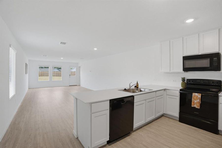 Furnished interior view inside a new home in Tillage Farms, Princeton (Image 9).