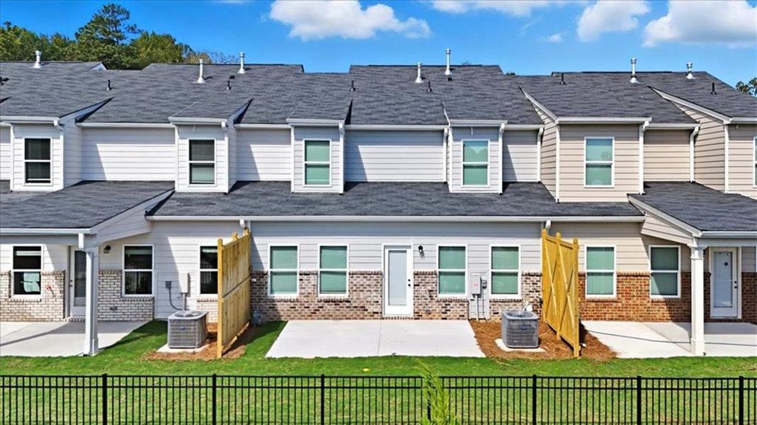 Exterior details and patio area of a home in Park Center Pointe, Austell (Image 2).