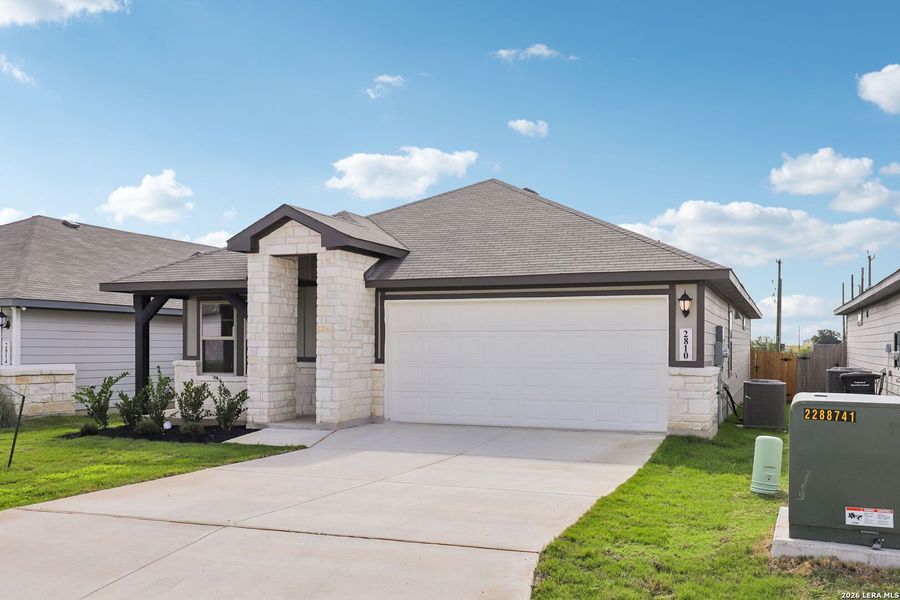 Front exterior of a new home in Catalina, Converse, TX, highlighting curb appeal (Image 2). Front exterior of a new home in Catalina, Converse, TX, highlighting curb appeal (Image 2).