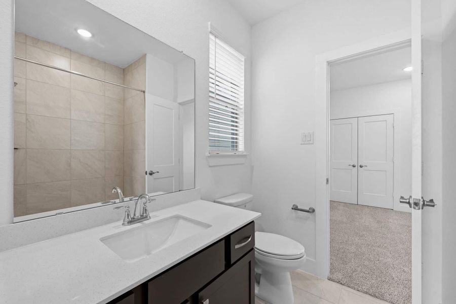 Furnished interior view inside a new home in Bridgeland, Cypress (Image 8).