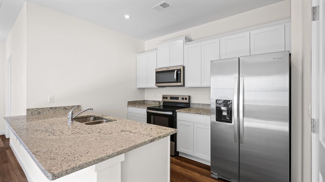 Furnished interior view inside a new home in Cambridge Cove, Chickamauga (Image 3).