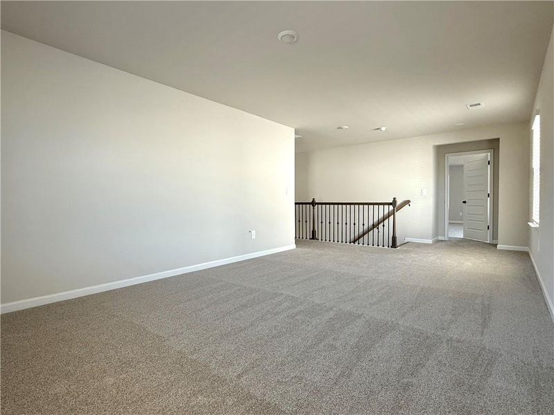 Spacious, unfurnished interior of a new home in Vines at Mill Creek - Estate Series, Braselton (Image 26).