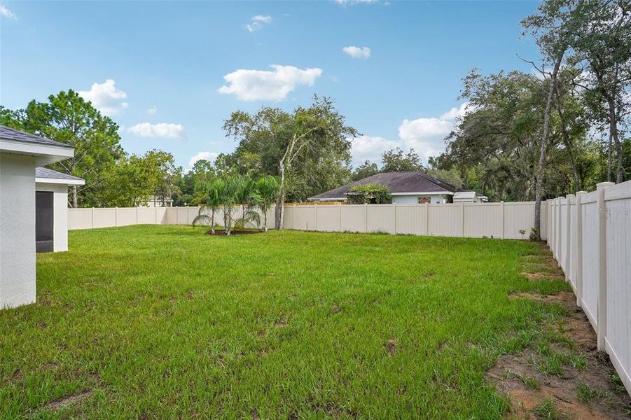 Exterior details and patio area of a home in , Citrus Springs (Image 40).