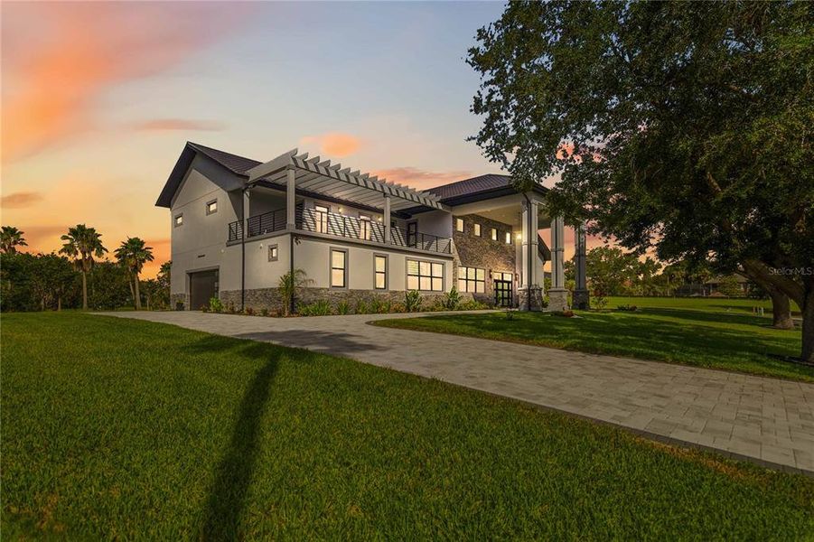 Front exterior of a new home in , Groveland, FL, highlighting curb appeal (Image 2).