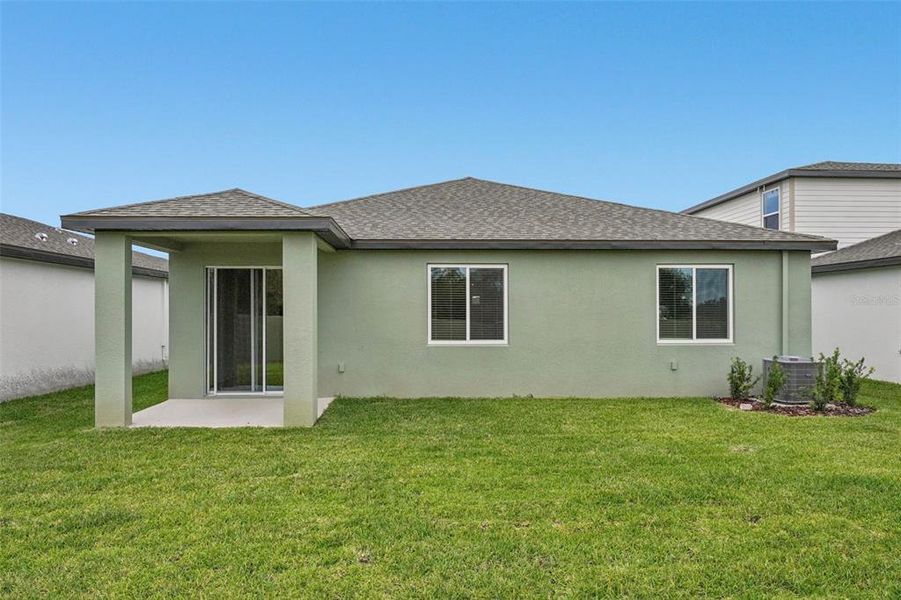Exterior details and patio area of a home in Two Rivers - Classic Series, Zephyrhills (Image 27).