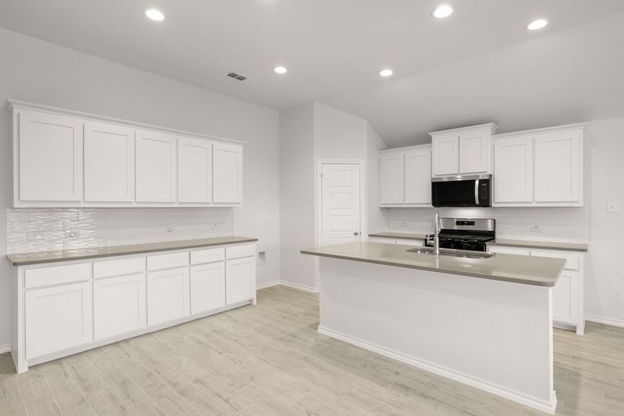 Representative exterior photo of a completed home built from the Austin by Impression Homes in Baker Farms, Cleburne, TX (Image 5).