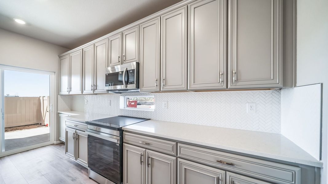 Furnished interior view inside a new home in The Reserve at Green Valley Ranch, Aurora (Image 6).