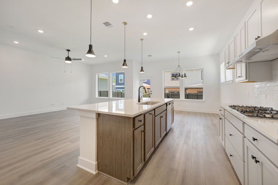 Furnished interior view inside a new home in Double Creek Crossing, Round Rock (Image 6).