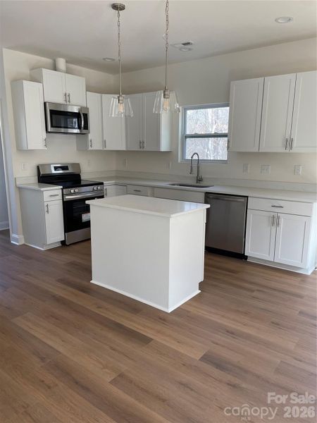 Furnished interior view inside a new home in , Statesville (Image 9).