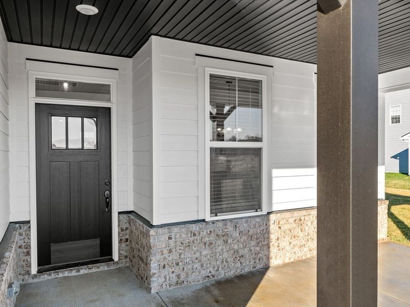 Exterior details and patio area of a home in Woods Crossing, Gallatin (Image 2).