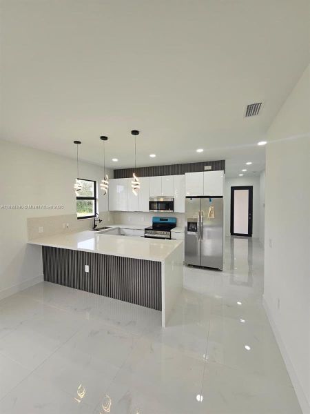 Furnished interior view inside a new home in , Lehigh Acres (Image 3).