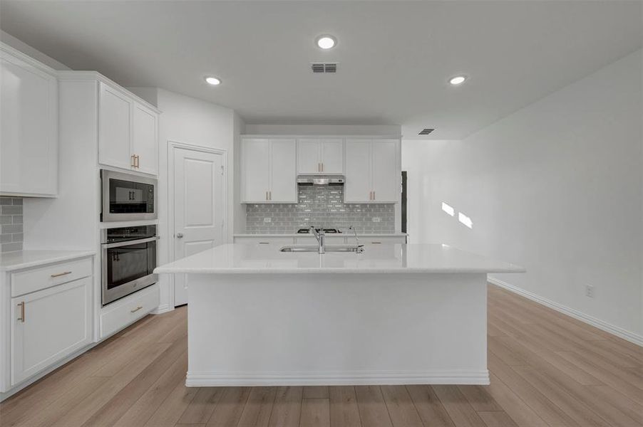 Furnished interior view inside a new home in Lily Creek at Sutton Fields, Aubrey (Image 15).