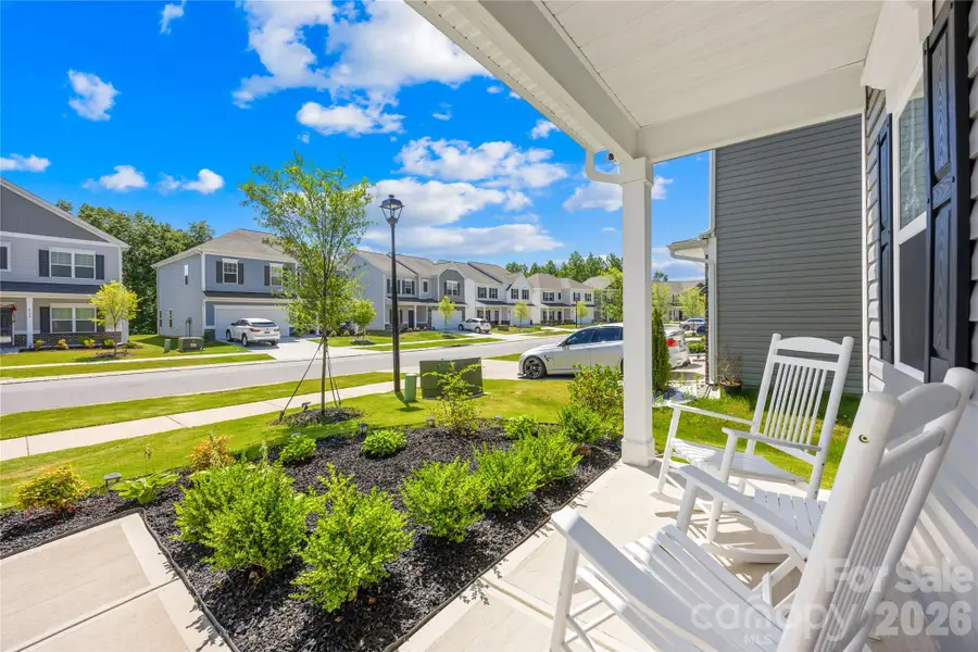 Exterior details and patio area of a home in Orchard Creek, Charlotte (Image 4).
