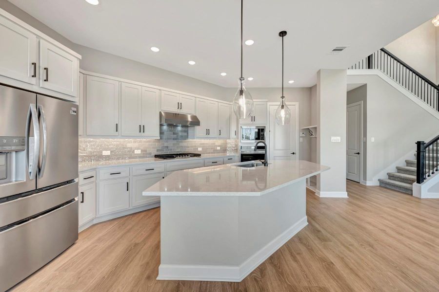 Furnished interior view inside a new home in COLTON - Reserve Collection, Todd Mission (Image 18).