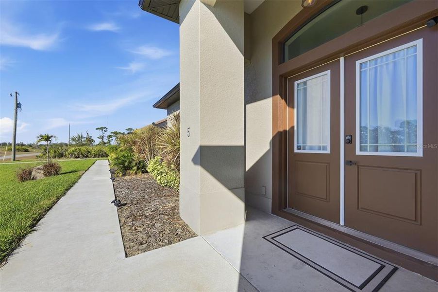 Exterior details and patio area of a home in , Placida (Image 26). Exterior details and patio area of a home in , Placida (Image 26).