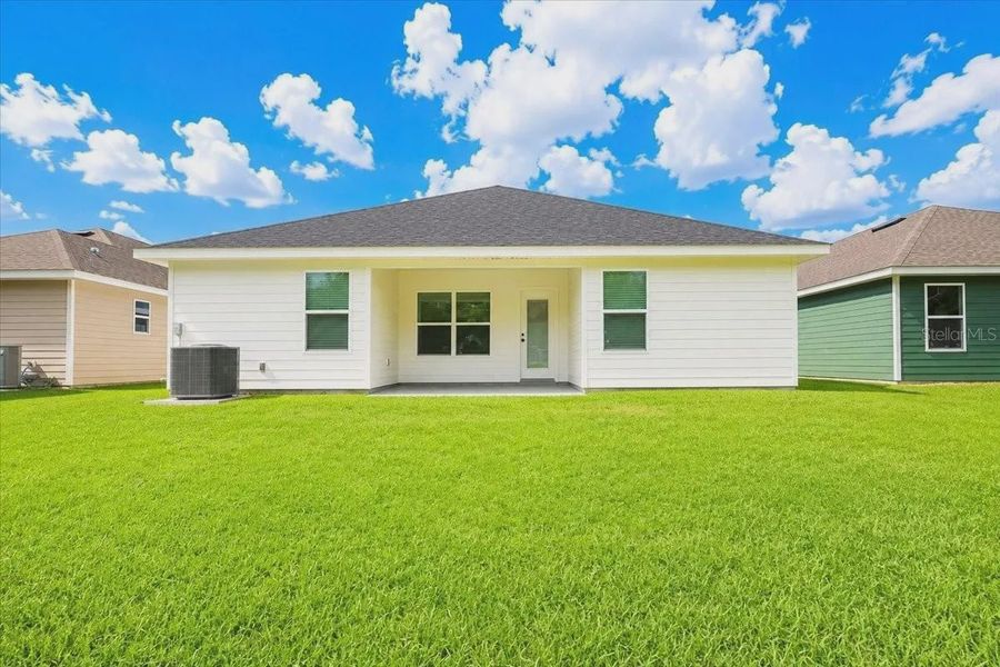 Exterior details and patio area of a home in Country Way South, Newberry (Image 3).