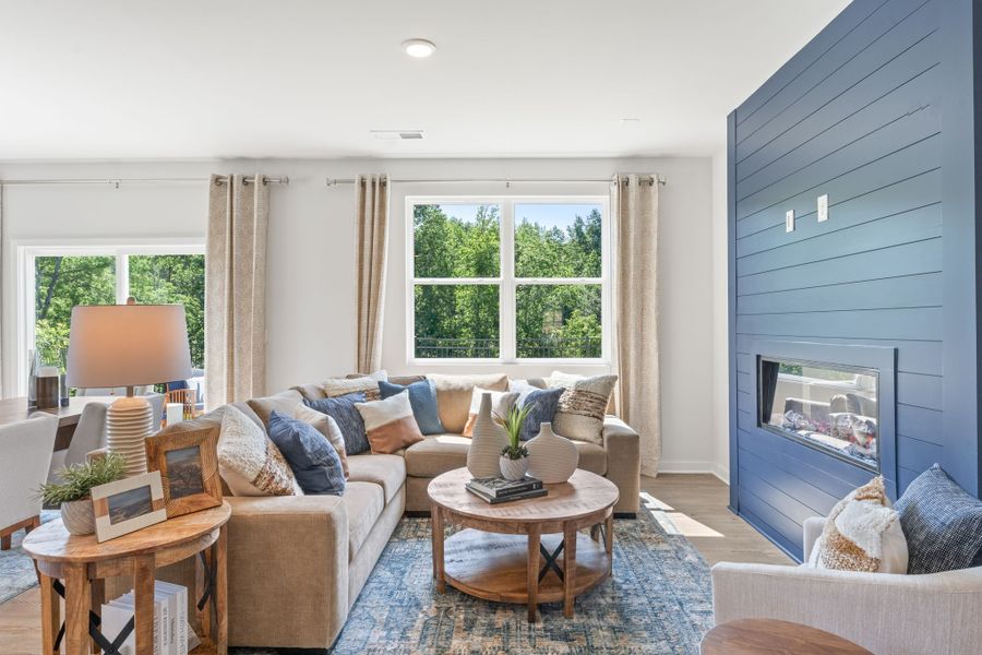 A living room with a couch and a coffee table.