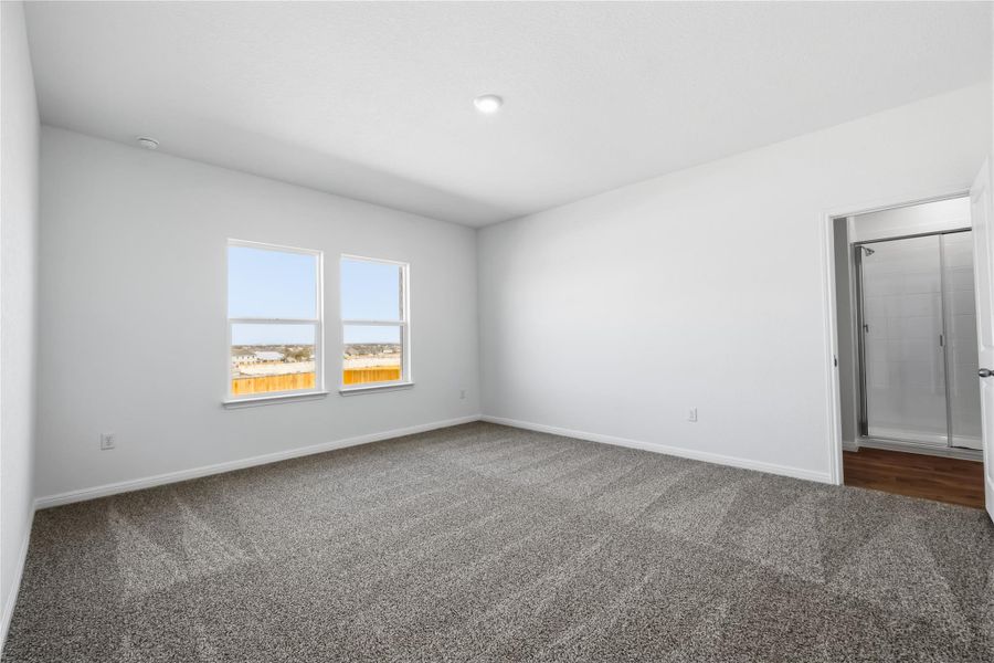 Spacious, unfurnished interior of a new home in Rosenbusch Ranch, Leander (Image 21).