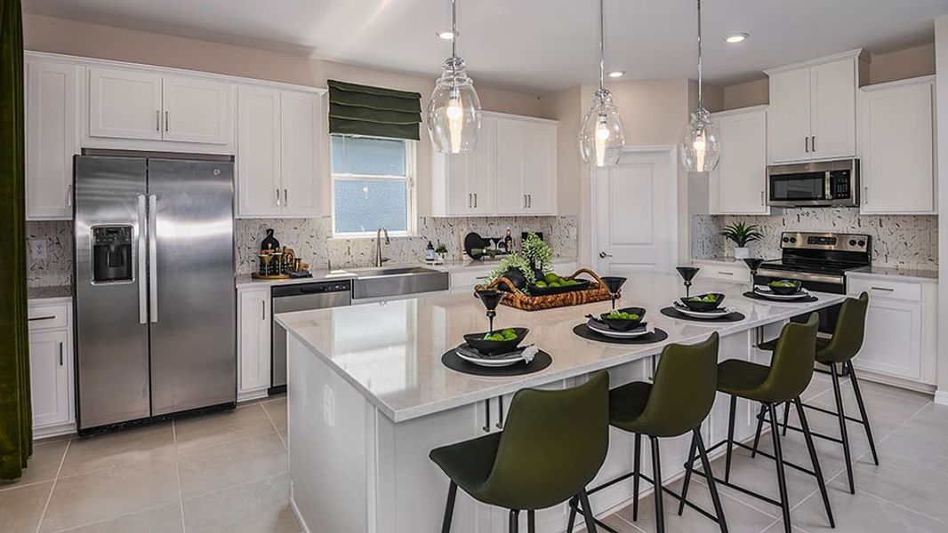 Representative furnished interior of a home built from the Amelia by Taylor Morrison in Brookland Park, Auburndale (Image 5).