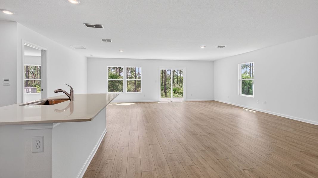 Representative unfurnished interior of a home built from the Aria+ by D.R. Horton in The Arbors, Jacksonville (Image 11).