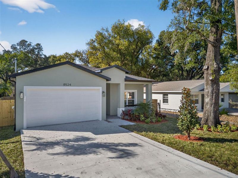 Front exterior of a new home in , Tampa, FL, highlighting curb appeal (Image 27). Front exterior of a new home in , Tampa, FL, highlighting curb appeal (Image 27).