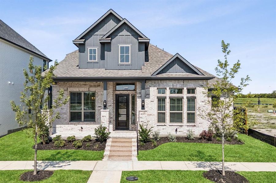 Front exterior of a new home in Talia, Mesquite, TX, highlighting curb appeal (Image 2).