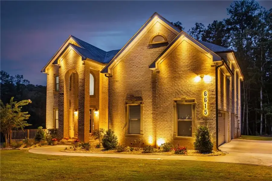 Front exterior of a new home in , Douglasville, GA, highlighting curb appeal (Image 24).