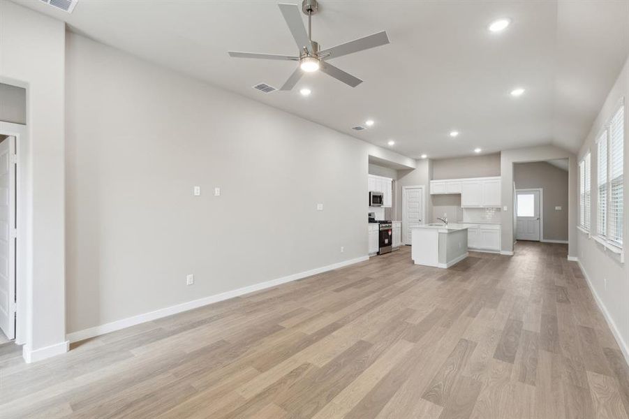 Open living space in in the Elm home plan by Trophy Signature Homes – REPRESENTATIVE PHOTO