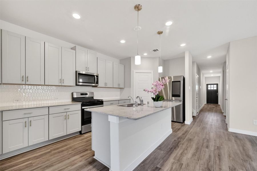 Furnished interior view inside a new home in Heights of Barbers Hill, Baytown (Image 8).