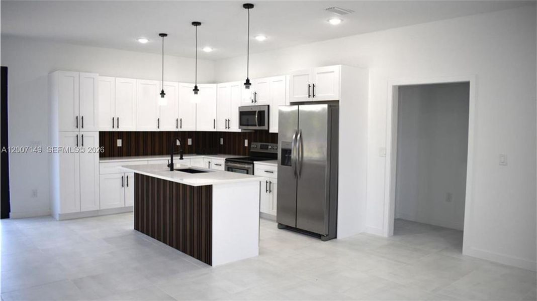 Furnished interior view inside a new home in , Lehigh Acres (Image 4). Furnished interior view inside a new home in , Lehigh Acres (Image 4).