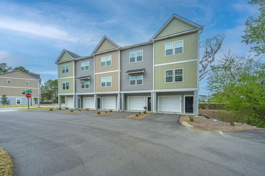 Front exterior of a new home in , Charleston, SC, highlighting curb appeal (Image 22).