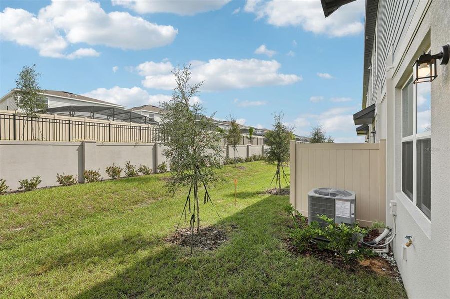 Exterior details and patio area of a home in Cagan Crossings West, Clermont (Image 25).