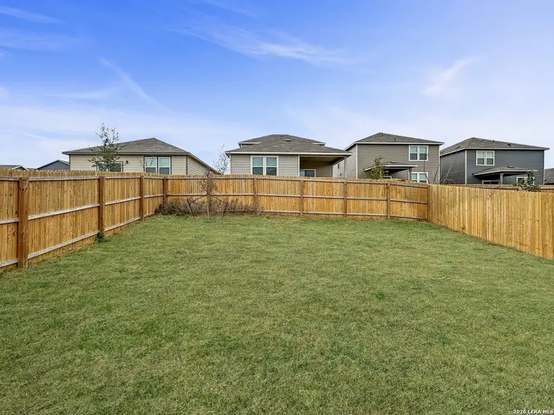 Exterior details and patio area of a home in Bear Creek, San Antonio (Image 3).