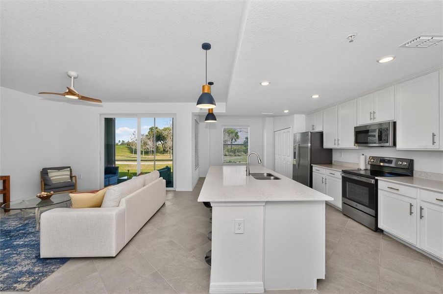 Furnished interior view inside a new home in Wellen Park Golf & Country Club, Venice (Image 43).
