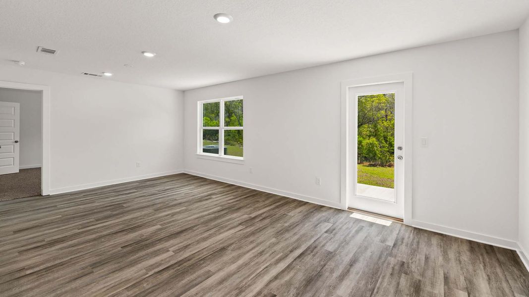 Spacious, unfurnished interior of a new home in Magnolia at the Bluffs Phase 3, Freeport (Image 13).
