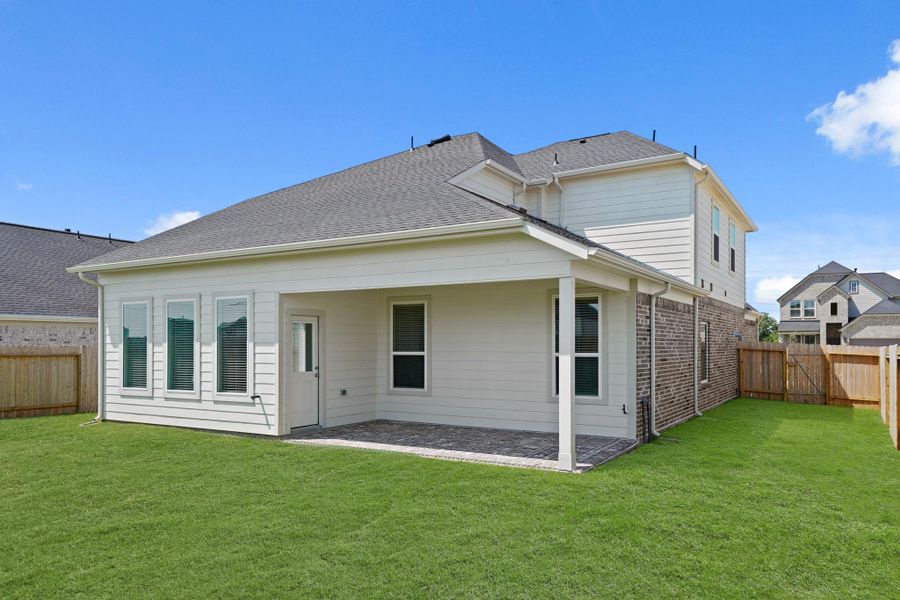 Front exterior of a new home in Briarwood Crossing, Rosenberg, TX, highlighting curb appeal (Image 18).