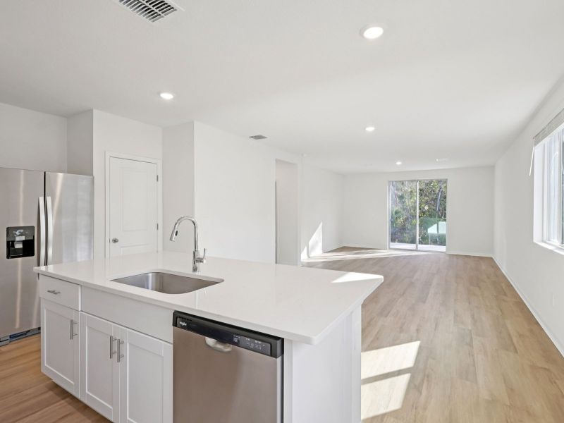 Furnished interior view inside a new home in The Grove at Stuart Crossing - Premier Series, Bartow (Image 5).