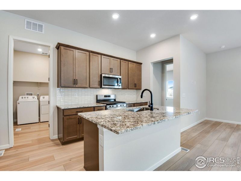 Furnished interior view inside a new home in Westside Crossing Paired Homes, Berthoud (Image 7). Furnished interior view inside a new home in Westside Crossing Paired Homes, Berthoud (Image 7).