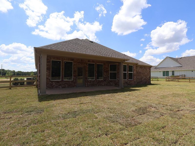 Exterior details and patio area of a home in Lone Star Landing, Montgomery (Image 3). Exterior details and patio area of a home in Lone Star Landing, Montgomery (Image 3).