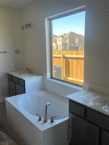 Primary Bath with Dual Vanities and Garden Tub