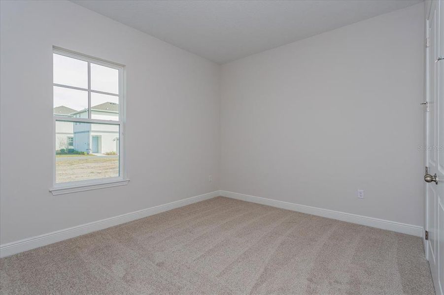 Spacious, unfurnished interior of a new home in Laureate Park at Lake Nona, Orlando (Image 15).