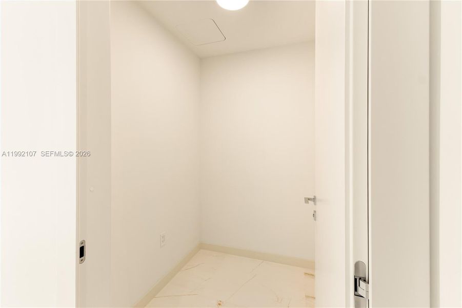 Spacious, unfurnished interior of a new home in Aston Martin Residences, Miami (Image 22). Spacious, unfurnished interior of a new home in Aston Martin Residences, Miami (Image 22).