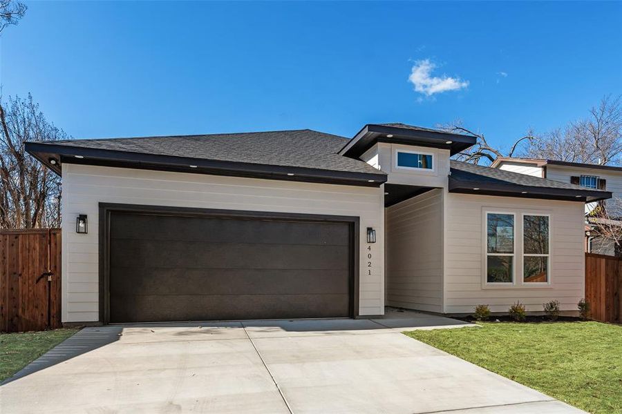 Front exterior of a new home in , Dallas, TX, highlighting curb appeal (Image 15).