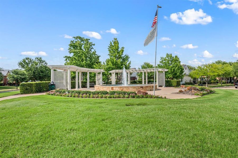 Front exterior of a new home in HomeTown Garden, North Richland Hills, TX, highlighting curb appeal (Image 26). Front exterior of a new home in HomeTown Garden, North Richland Hills, TX, highlighting curb appeal (Image 26).