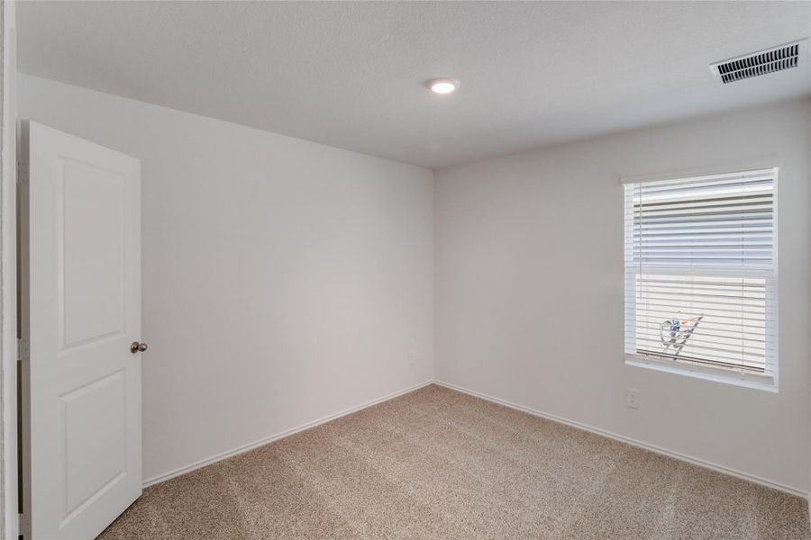 Spacious, unfurnished interior of a new home in Watermill, Uhland (Image 15).