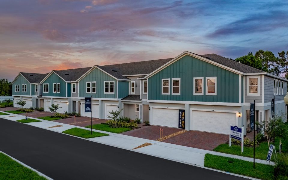 Representative exterior photo of a completed home built from the Douglas by Trinity Family Builders in Blue Springs Reserve Townhomes, Groveland, FL (Image 7).