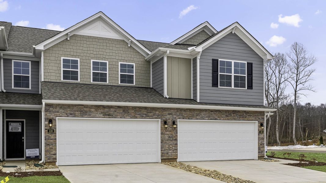 Front exterior of a new home in Lybrook Village, Advance, NC, highlighting curb appeal (Image 12).